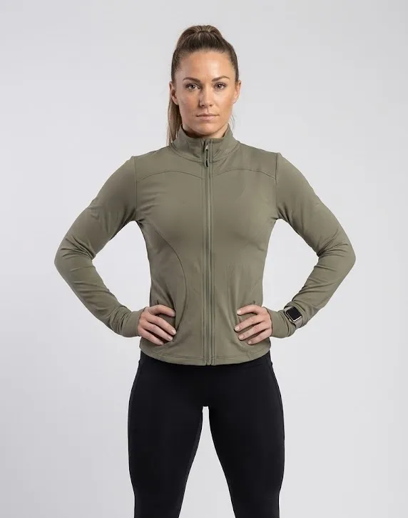 Sudadera color gris de licra para mujer, ideal para entrenamiento en el gimnasio.