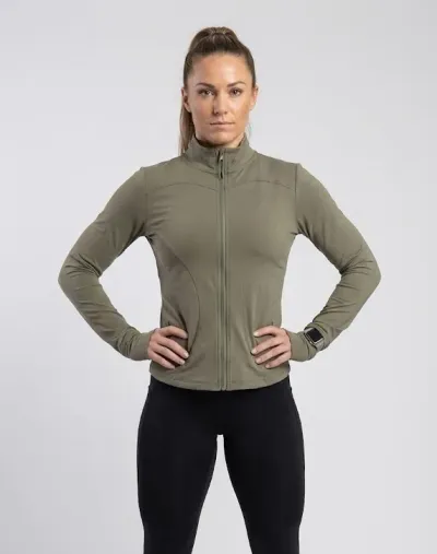Sudadera color gris de licra para mujer, ideal para entrenamiento en el gimnasio.